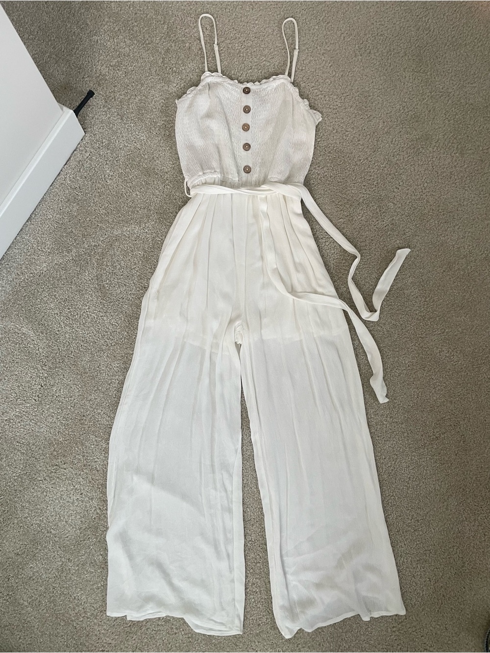 Gauzy White Sleeveless Wide-Leg Smocked Jumpsuit with Tie Waist